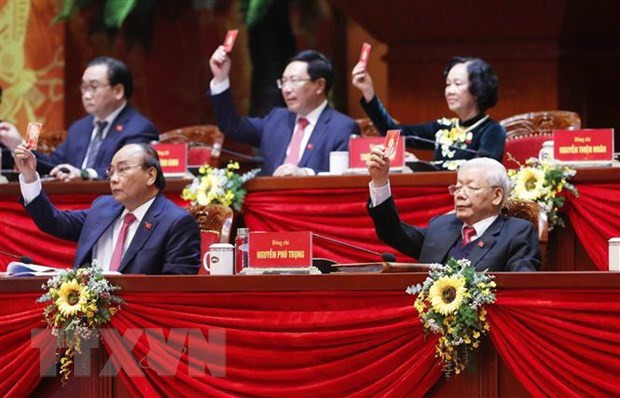 越南领导人表决通过越共十三大议程。图自越通社 越共十三大:外媒突出大会的议程 ảnh 1