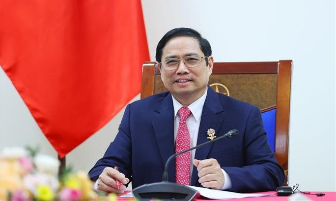 政府总理范明政与智利总统塞巴斯蒂安·皮涅拉通电话。图自越通社 政府总理范明政与智利总统塞巴斯蒂安·皮涅拉通电话 ảnh 1