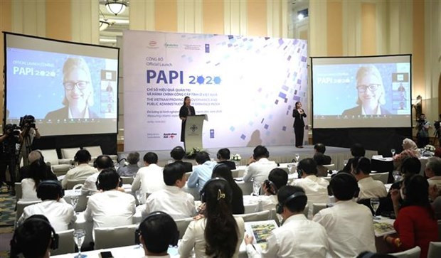 2020年越南省级公共行政和治理绩效指数(PAPI)的报告公布仪式场景。图自越通社 2020年PAPI报告:越南省级公共行政和治理发生积极变化 ảnh 1