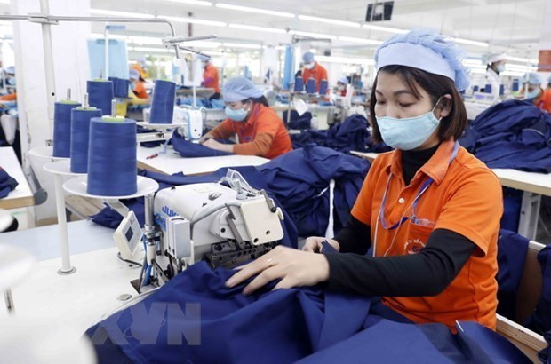 资料图。图自越通社 越南纺织产业恢复强劲增长势头 ảnh 1