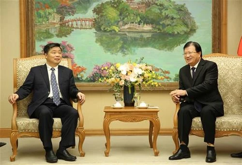 越南政府副总理郑廷勇会见中国广东省副省长欧阳卫民