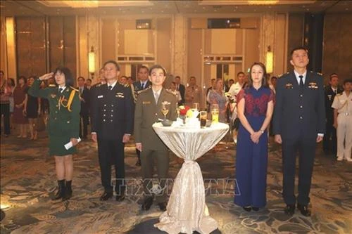 越南人民军建军75周年纪念活动在新加坡举行