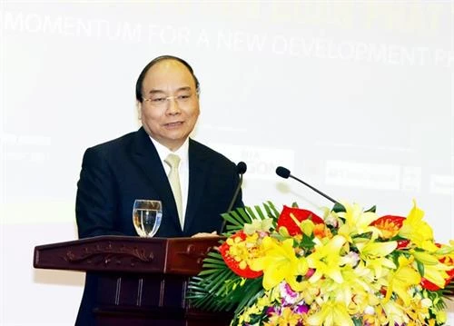 阮春福：越南政府努力兑现国际承诺 大力推进经济改革