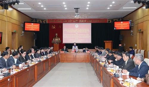 越共中央民运部部长张氏梅会见老挝建国阵线中央委员会代表团