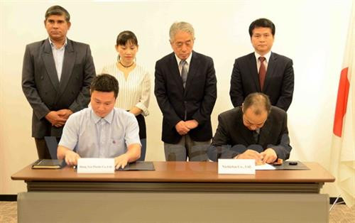 越南与日本代表签署合作协议。（图片来源：越通社）