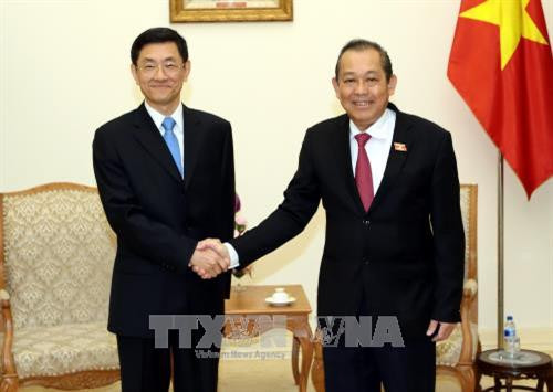 政府副总理张和平会见中国国家安全部副部长唐朝。（图片来源：越通社）