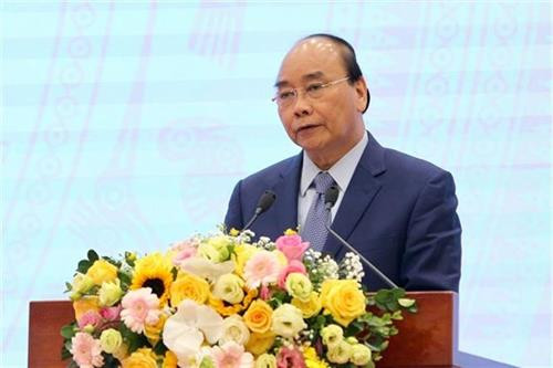 阮春福在会议上发表讲话。图自越通社 阮春福在会议上发表讲话。图自越通社