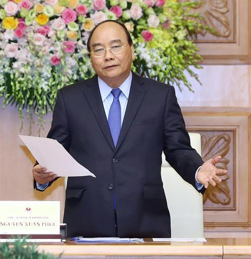 政府总理阮春福发表讲话。 图自越通社
