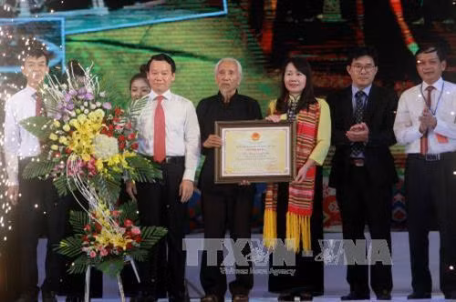 傣族憨框国家级非物质文化遗产证书授证仪式。（图片来源：越通社）