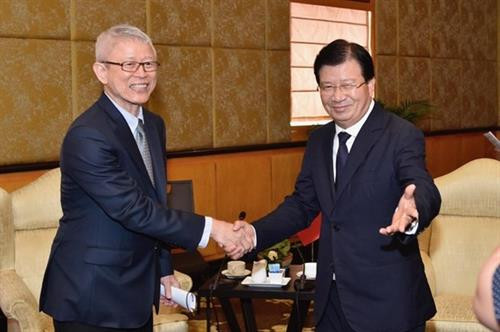 政府副总理王廷惠会见暹罗城水泥（越南）公司董事长Dhep Vongvanich。图自越通社
