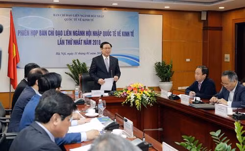 越南全球经济一体化跨部门指导委员会主任王廷惠发表讲话。（图片来源：越通社）