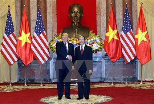 越南国家主席陈大光和美国总统特朗普。（图片来源：越通社）