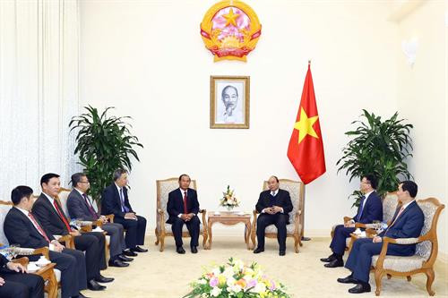 越南政府总理阮春福会见老挝司法部部长 图自越通社