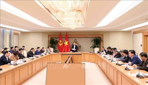 会议场景。图自越通社