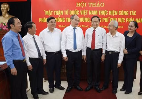 与会代表。图自越通社