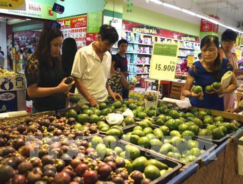 资料图：鲜果和加工果价格下降。（图片来源：越通社）