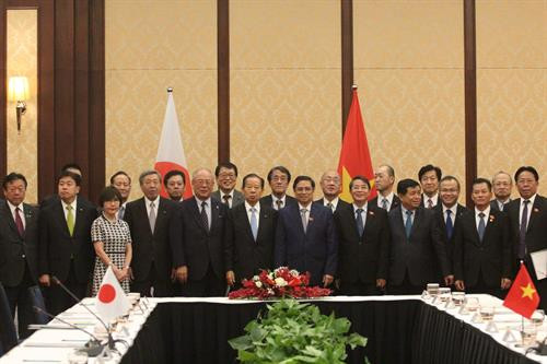 与会代表合影。图自越通社