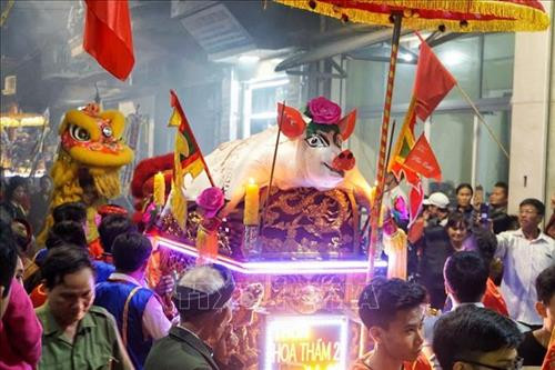 河内市怀德县罗扶乡独特的“迎猪翁”仪式。图自越通社