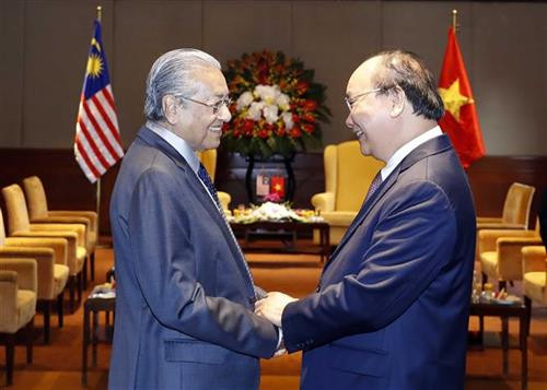 越南政府总理阮春福与马来西亚总理马哈蒂尔·穆罕默德。图自越通社