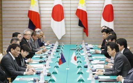 双方会谈场景。图自越通社