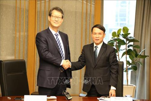 越通社社长阮德利与韩联社社长朴鲁晃。图自越通社 越通社社长阮德利与韩联社社长朴鲁晃。图自越通社