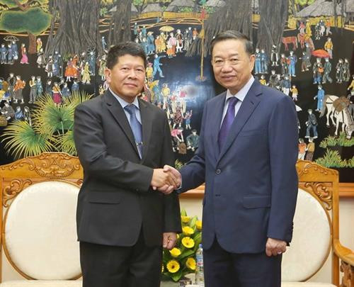 越南公安部长苏林上将会见泰国国家安全理事会秘书长Wanlop Rugsanaoh大将。越通社记者 尹俊 摄