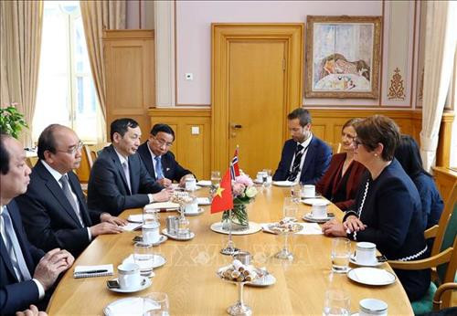 会见场景。图自越通社