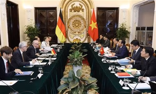 会议场景。图自越通社 会议场景。图自越通社