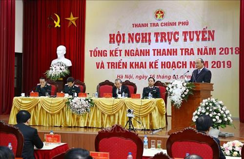 阮春福总理出席政府监察总署工作总结会议。图自越通社