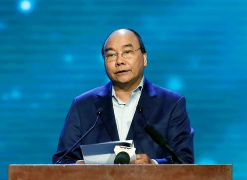 越南政府总理阮春福出席活动并发表重要讲话。图自越通社 越南政府总理阮春福出席活动并发表重要讲话。图自越通社