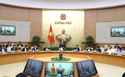 越南政府3月8日就制度建设问题召开专题会议。图自越通社