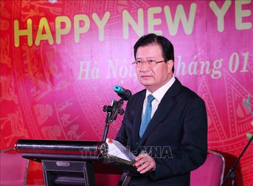 郑廷勇在见面会上发表讲话。图自越通社 郑廷勇在见面会上发表讲话。图自越通社