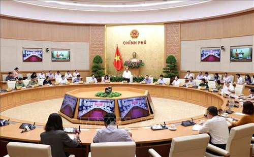 会议场景。图自越通社 会议场景。图自越通社