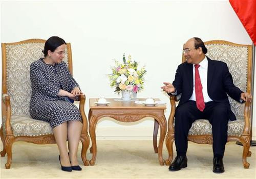 越南政府总理阮春福会见罗马尼亚外交部国务秘书格奥尔基策。图自越通社