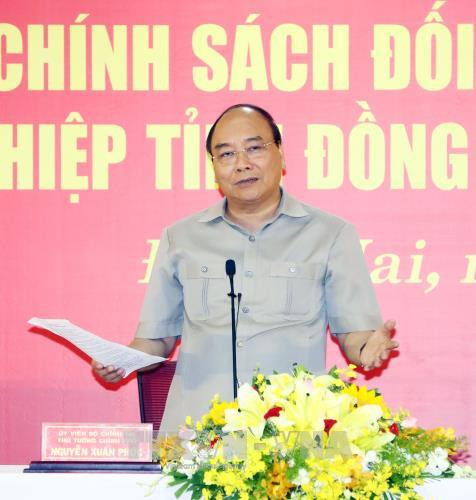 阮春福在会议上发表讲话。（图片来源：越通社）