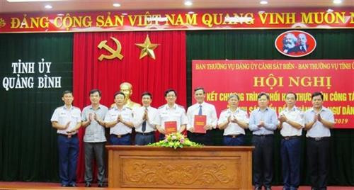 “海警与渔民同行”的民运工作配合活动的签署仪式。图自越通社
