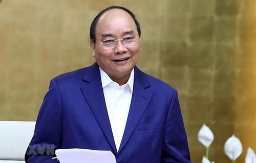 政府总理阮春福发表讲话 图自越通社