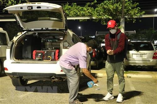 附图:在金边国际机场进行喷雾消毒。图自越通社 附图:在金边国际机场进行喷雾消毒。图自越通社