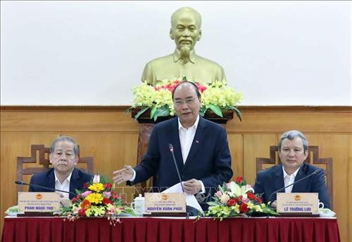 阮春福发表讲话。图自越通社