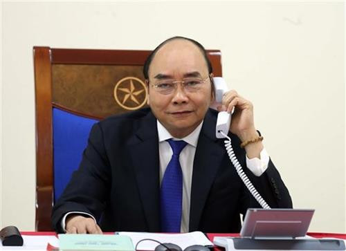 越南政府总理阮春福与澳大利亚总理通电话。图自越通社 越南政府总理阮春福与澳大利亚总理通电话。图自越通社