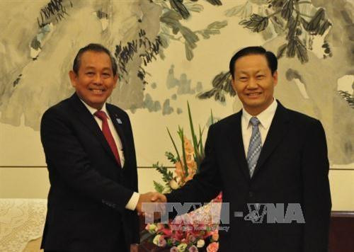 张和平会见中共广西壮族自治区党委书记彭清华。（图片来源：越通社）