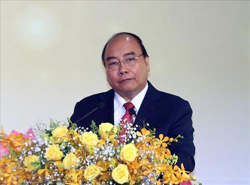 政府总理阮春福发表讲话。图自越通社