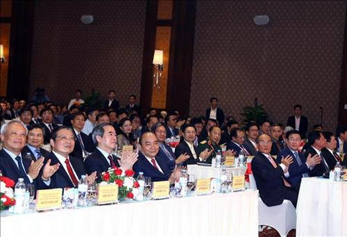 政府总理阮春福出席投资商新春见面会。图自越通社