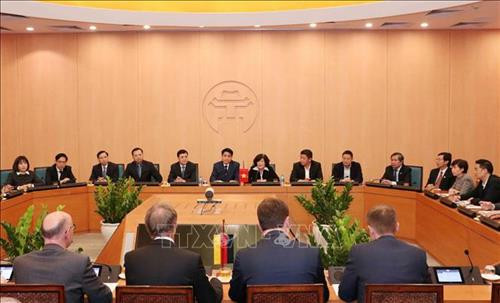 工作座谈会场景。图自越通社