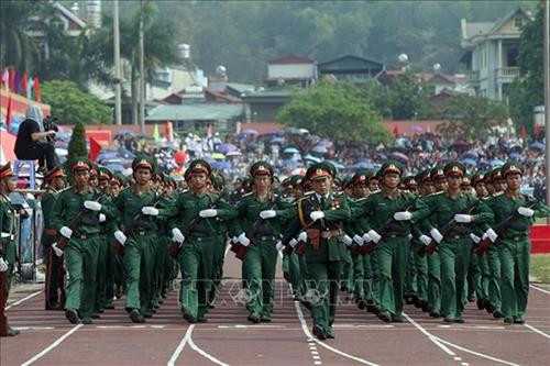 庆祝奠边省各重大事件的阅兵游行活动。图自越通社 庆祝奠边省各重大事件的阅兵游行活动。图自越通社