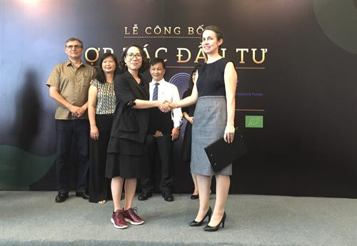 双方互换投资合作协议。图自越通社