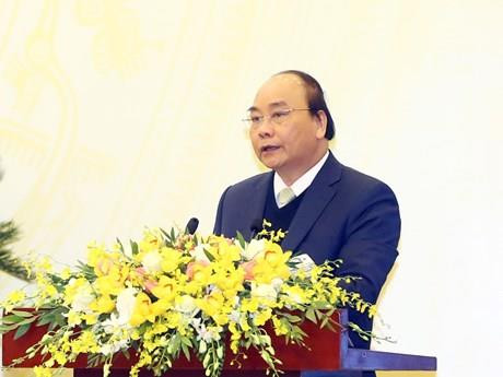政府总理阮春福在会议上发表讲话（图片来源：越通社）
