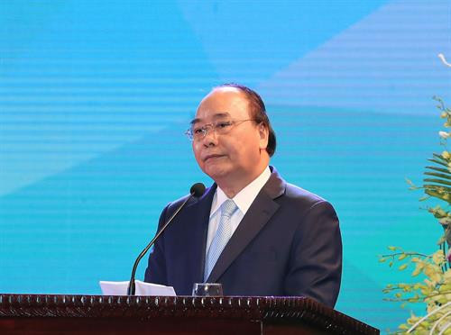 政府总理阮春福在典礼上发表讲话。越通社记者 统一 摄