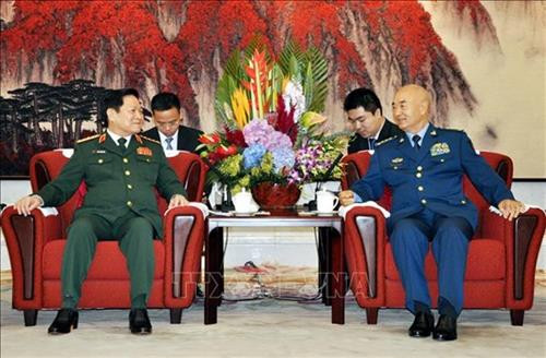 吴春历会见许其亮。图自越通社 吴春历会见许其亮。图自越通社