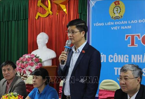 越南劳动总联合会副主席午维晓发表讲话 图自越通社
